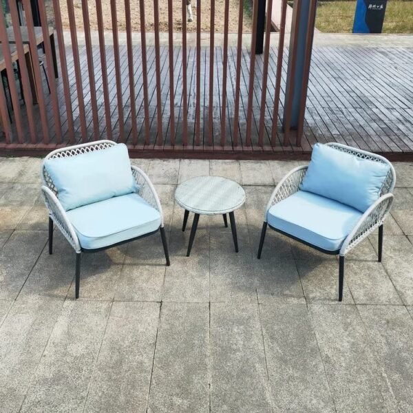 Modern LOCCUS outdoor bistro set with two cushioned wicker chairs and square glass coffee table.