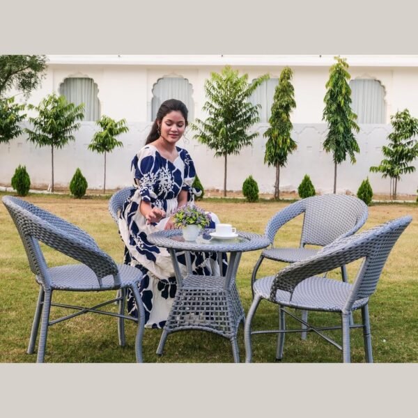 Gray wicker outdoor patio furniture set with chairs and table by LOCCUS for balcony garden terrace