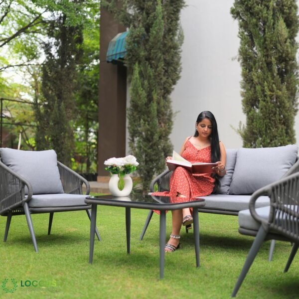 LOCCUS Outdoor Rope Sofa Set with seating for four, grey cushions, and a sleek glass top table. Built with a strong metal frame and handwoven rope, designed for garden, patio, poolside, and balcony relaxation.