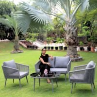 LOCCUS Outdoor Rope 4-Seater Sofa Set in grey with water-repellent cushions, durable metal frame, and handwoven rope design. Includes a stylish glass top table, perfect for garden, patio, pool deck, or balcony outdoor furniture.