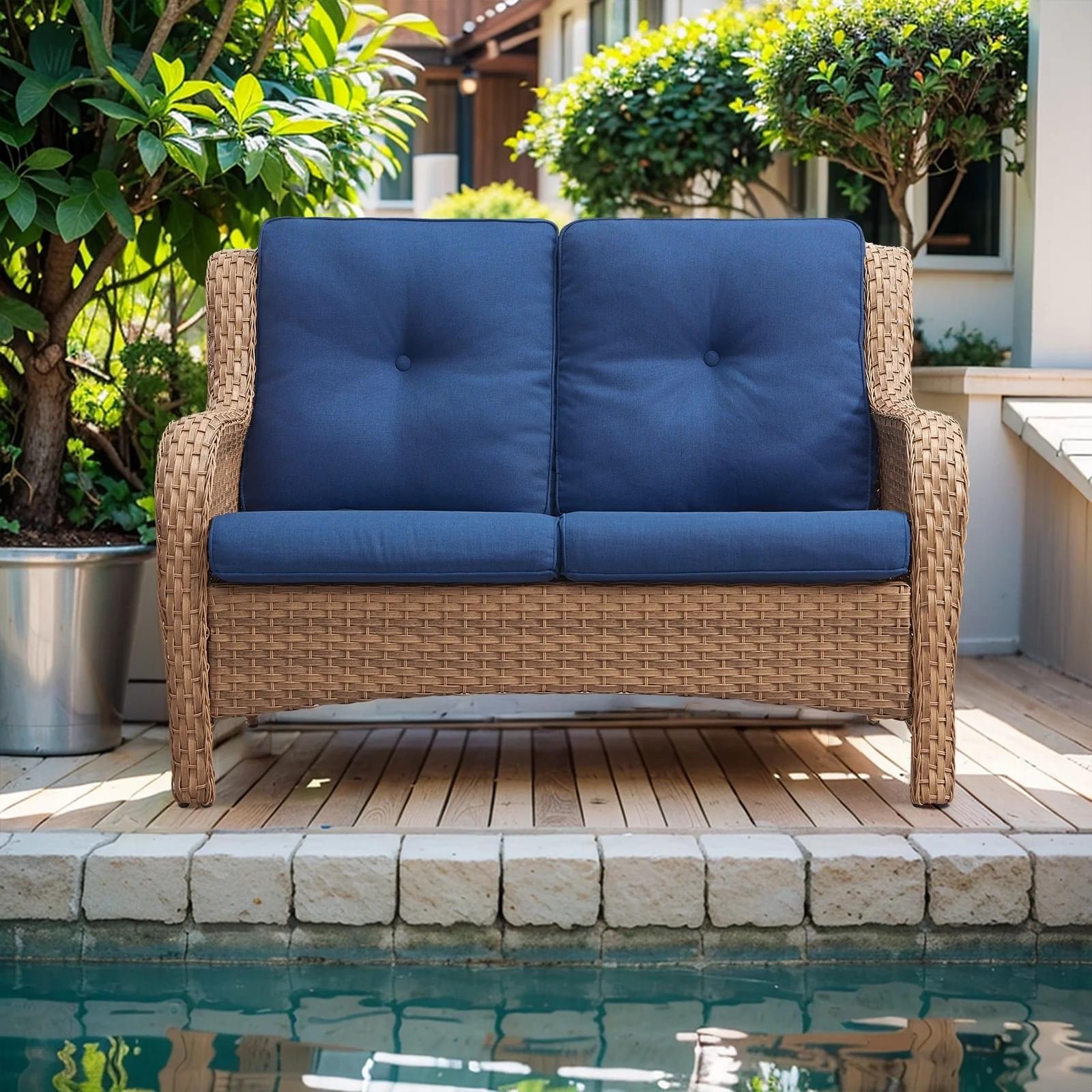 Double seater rattan wicker sofa with soft cushions for patio or garden seating