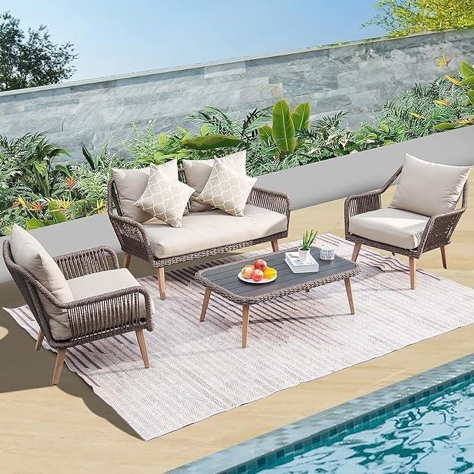 "4-piece outdoor rope sofa set with cushions and table for patio or balcony seating"